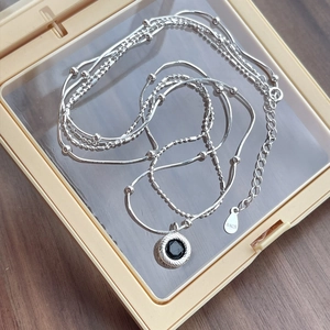S925 sterling silver layered necklace with round black onyx pendant on beaded and snake chain