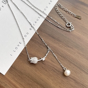 Elegant S925 sterling silver tulip necklace featuring cubic zirconia and freshwater pearl