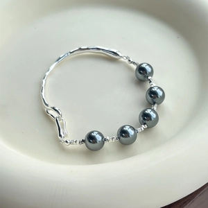 Minimalist S925 sterling silver bangle with asymmetrical black pearls and irregular metal