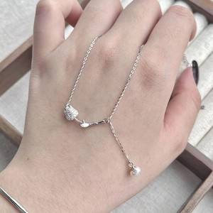 Elegant S925 silver tulip pendant necklace featuring a white freshwater pearl and cubic zirconia
