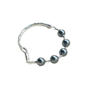 S925 sterling silver cuff bracelet featuring dark grey pearls and textured metal accents