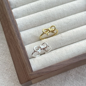 Elegant S925 sterling silver bow rings in gold and silver finish with adjustable bands