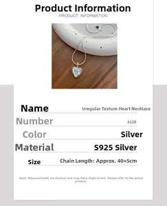 Detailed view of S925 silver heart necklace with blue zircon and irregular texture