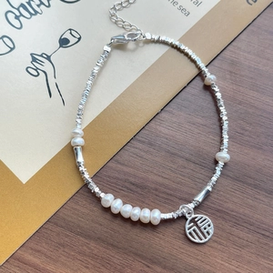 S925 Sterling silver bracelet with freshwater pearls and silver beads featuring a Fu charm