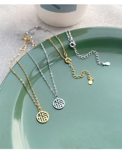Detail of S925 sterling silver Fu pendant necklace with elegant hollow Chinese character