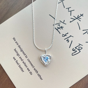S925 silver heart necklace with blue zircon and hammered lava texture on snake chain