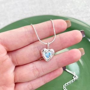 S925 sterling silver heart necklace with blue zircon and irregular lava texture detail