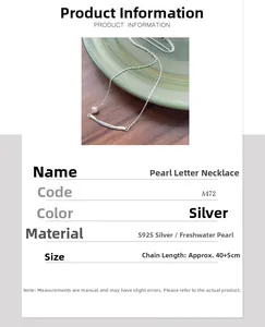 Detail view of S925 silver necklace with freshwater pearl and Freedom engraved curved bar