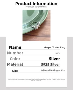Detail view of S925 sterling silver grape cluster ring with polished beads and open band