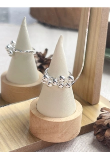 Detailed view of S925 sterling silver ring featuring a polished grape cluster bead design