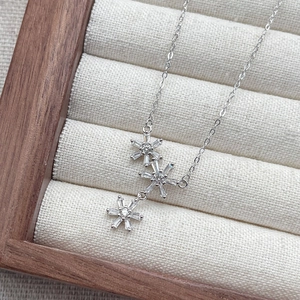 Elegant S925 sterling silver necklace with three sparkling snowflake pendants and zircons