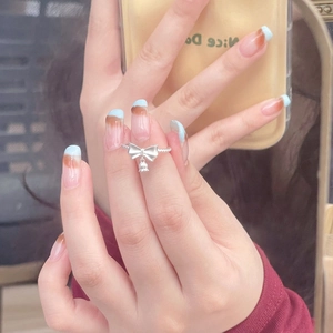 S925 sterling silver bow lily of the valley ring with rope texture band on finger