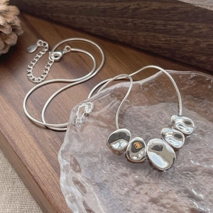 Elegant S925 sterling silver snake chain necklace with five irregular lava metal beads
