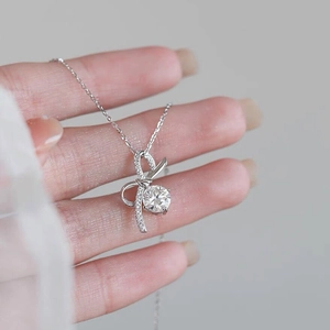 Élégant Collier Pendentif Nœud en Argent Sterling S925 Zircone Ronde Étincelante Nœud Ruban Chaîne de Clavicule pour Femmes Cadeau Bijoux de Mode
