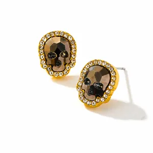 Pendientes de calavera punk con gema gris humo y diamantes de imitación blancos dorados