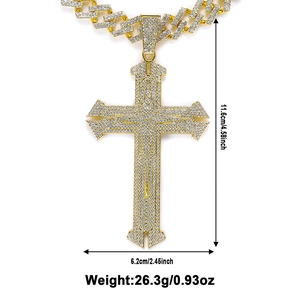 Detail view of iced out hip hop cross pendant with dimensions 11.6cm height and 6.2cm width