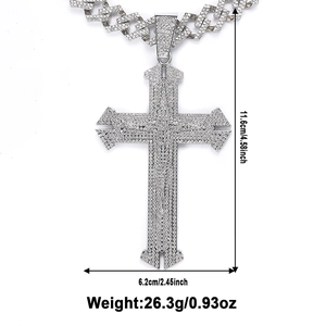 Detailed view of hip hop cross pendant with dimensions 11.6cm by 6.2cm and iced out stones
