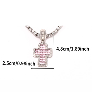 Detailed view of hip hop cross pendant with pink square stone and 4.8cm height measurement