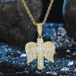Detail of gold angel wing cross pendant with micro-pasted zircons on a rope chain