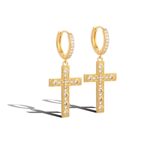 Detail showing the S925 hallmark on gold-plated cross earrings with micro-inlaid zircons