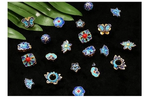 Detailed collection of blue enamel butterfly and floral metal charms for DIY jewelry