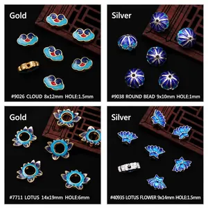 Detailed view of alloy cloisonné enamel beads in cloud and lotus patterns for DIY jewelry