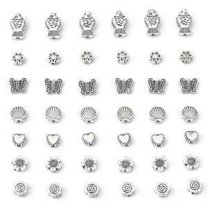 Set de cuentas de aleación de plata vintage con peces, mariposas y corazones para joyería