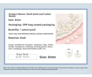 Macro view of 8mm shell alphabet beads with gold foil lettering for DIY jewelry