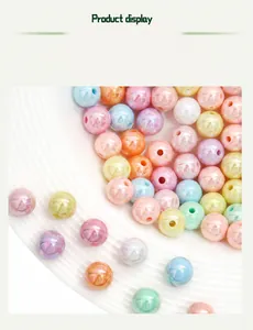 Macro detail of colorful pearlescent acrylic beads for DIY jewelry making and crafts