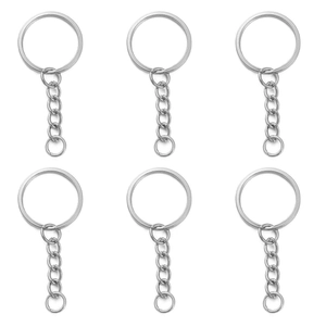 Bulk set of six flat silver metal keychains with link chains on white background