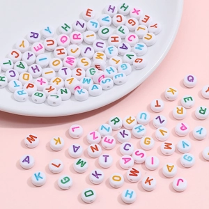 4x7mm acrylic letter beads for DIY jewelry with colorful alphabets in a porcelain dish