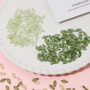 Mini acrylic leaf beads in light and emerald green for DIY handmade jewelry crafting