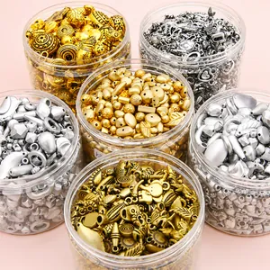 Assorted vintage baroque acrylic beads and metallic charms for DIY jewelry making