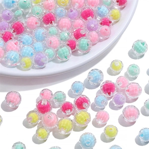 Macro shot of colorful faceted acrylic beads in candy colors for DIY jewelry making