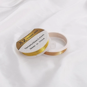 Bobinas de hilo de cobre de 0,4 mm en oro y oro rosa para joyería sobre seda blanca