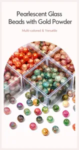 Macro shot of colorful pearlescent crackle glass beads with gold powder for DIY jewelry