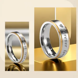 Close-up of titanium steel ring with Forever Love engraving and vacuum plating.
