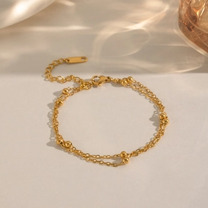 Élégant bracelet double couche en acier inoxydable doré avec perles et fermoir mousqueton