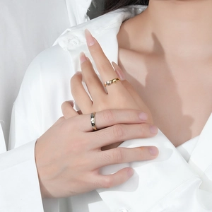 Creative S925 silver honey bee couple rings with gold dripping design worn by a model