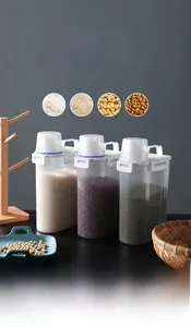 Detail view of the food-grade cereal storage container with a measuring cup lid