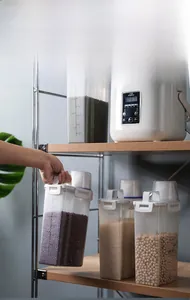 Detail view of transparent food storage container with measurement scale and handle