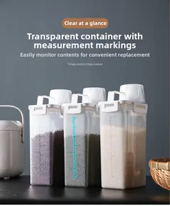 Detail view of 2L transparent grain storage jars with scale markings and white handles