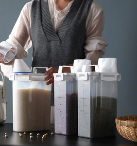 Macro detail of clear storage jars with measurement scales for grains and rice