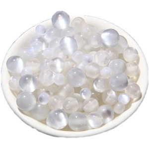 DIY jewelry making supplies with translucent white cat eye resin beads in multiple sizes