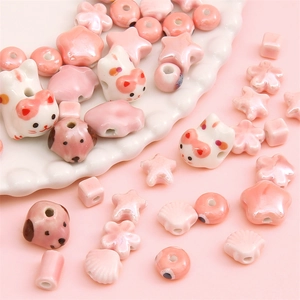 Pink ceramic bead set with cat, flower and star shapes for DIY jewelry making