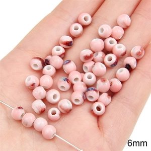 Pink ceramic 6mm round beads with marbled texture for DIY jewelry making crafts