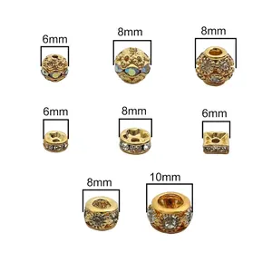 Assorted gold crystal spacer beads and charms in 6mm, 8mm, and 10mm sizes for DIY jewelry