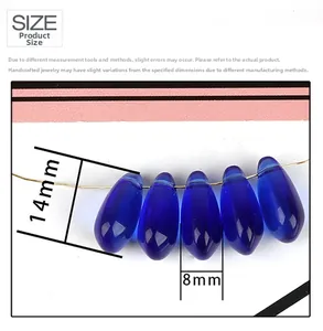 Detailed view showing dimensions 14x8mm of blue teardrop-shaped glass beads for jewelry