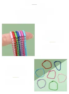 Close-up of colorful paint-baked ball chain keychains for DIY jewelry making and crafts