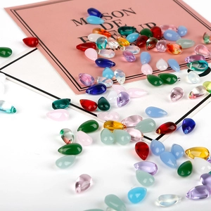 Vibrant teardrop Czech glass beads in multiple colors for DIY handmade jewelry crafts